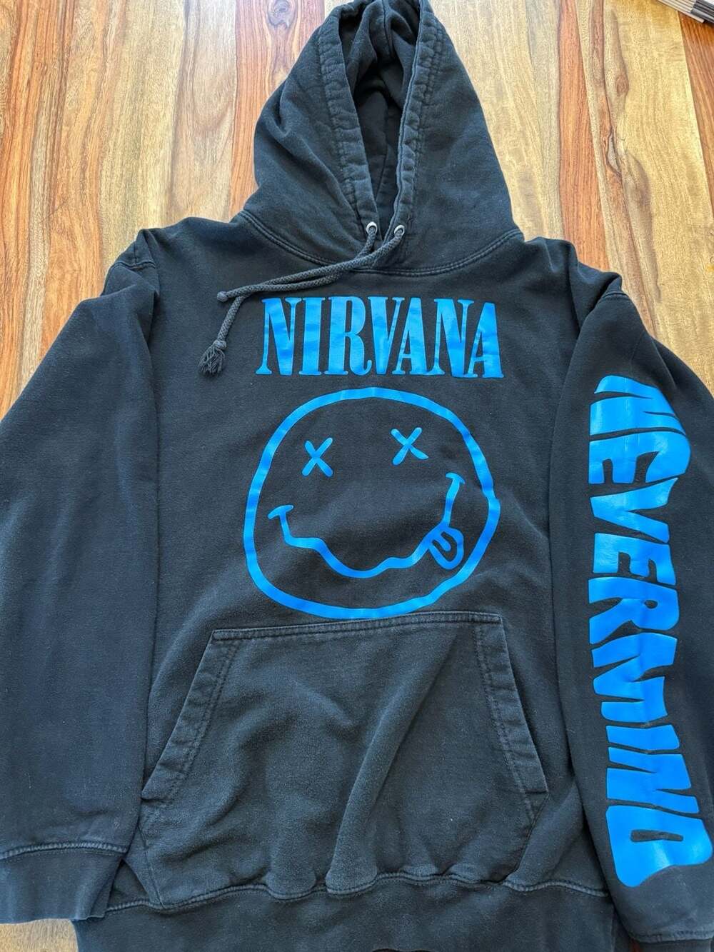 Nirvana Blue Smiley Nevermind Logo Sleeve Graphic Hoodie